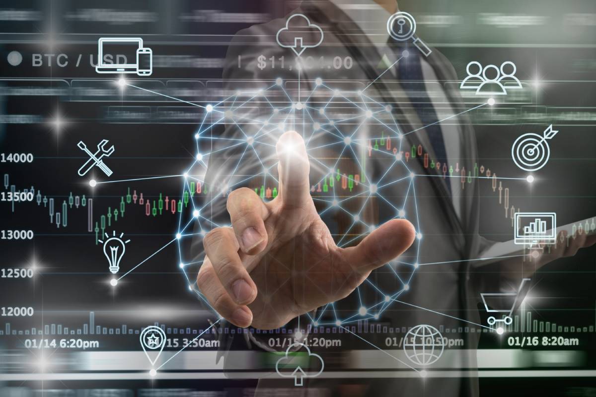Man pointing at digital network diagram