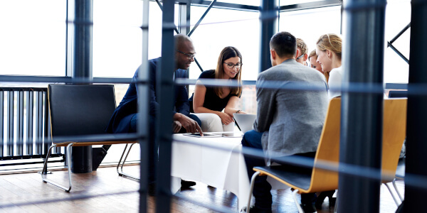 Group of Business People Around Coffee Table