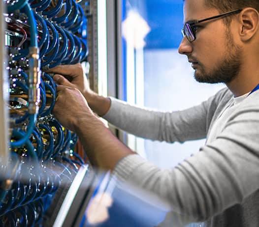 IT technician working with cabling