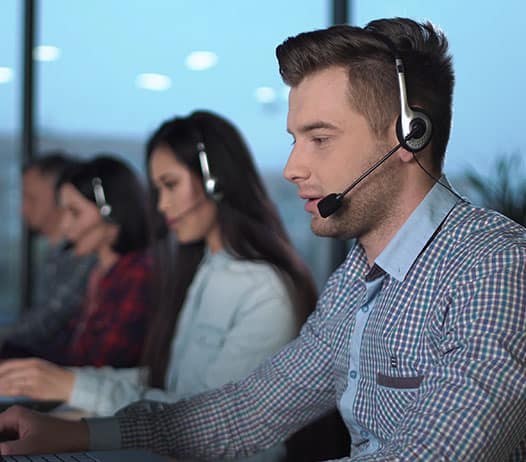 Call Center Representatives Wearing Headsets